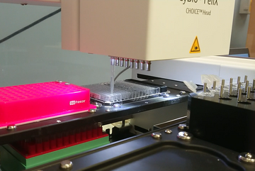 A CyBio Felix Choice head pipetting into a 96-well plate with a single disposable tip