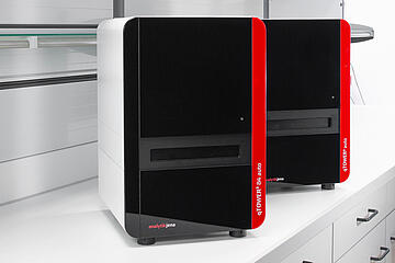 rendering of two qTOWER3 Auto units on a lab bench