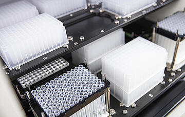 CyBio Felix deck with labware for performing nucleic acid extraction